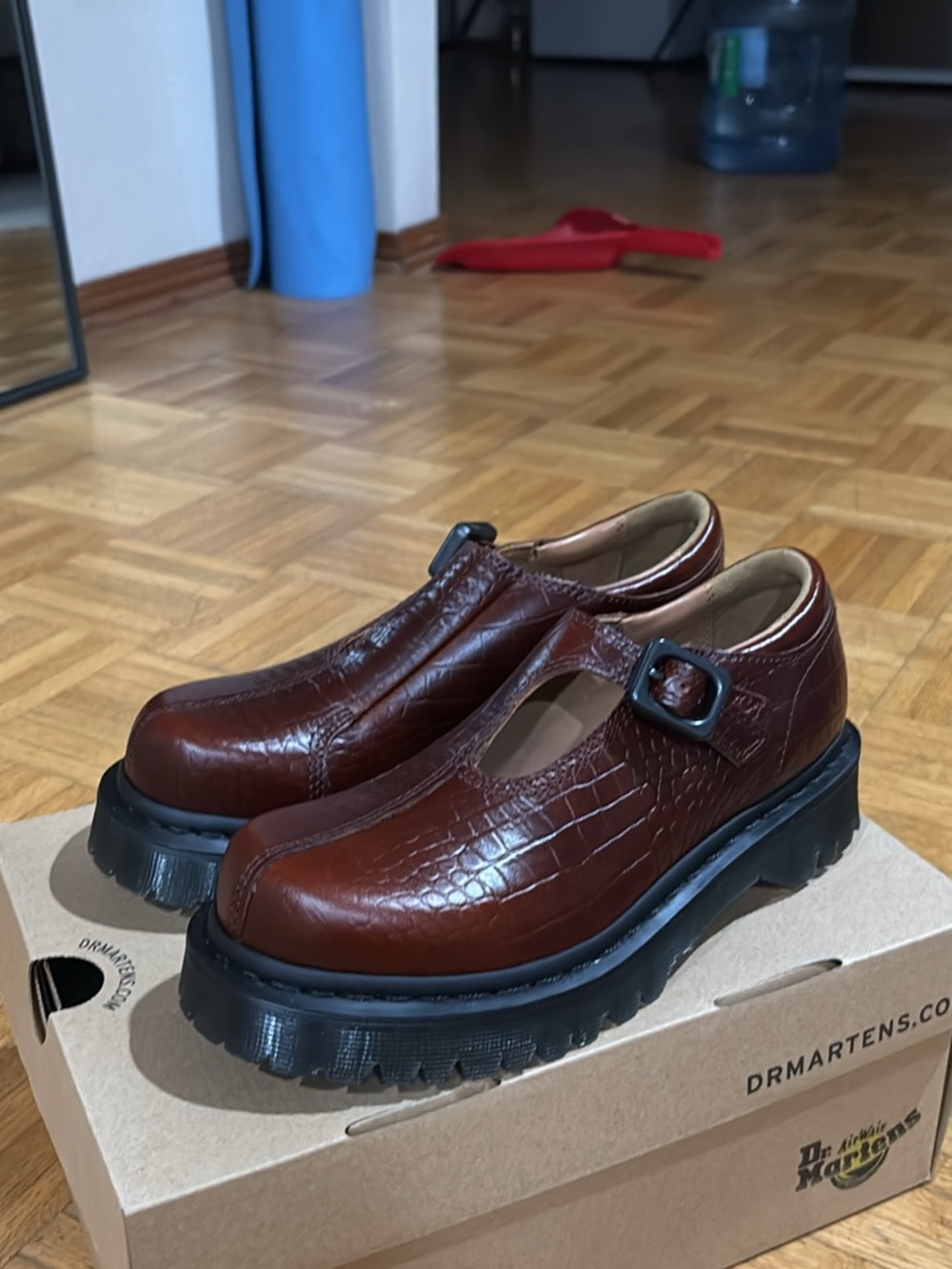 Dr. Martens Brown Croc-Embossed Mary Jane Loafers with Black Lug Sole